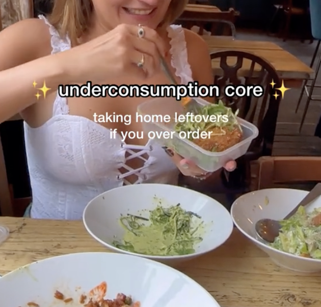 woman at the restaurant packing leftovers
